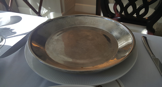 It's all in the details at Atlanta's best luxury hotel, Mandarin Oriental, where every in room entree is enclosed in a multitude of plates, including this heated metal one to keep the food very warm in the delivery from kitchen to your room.
